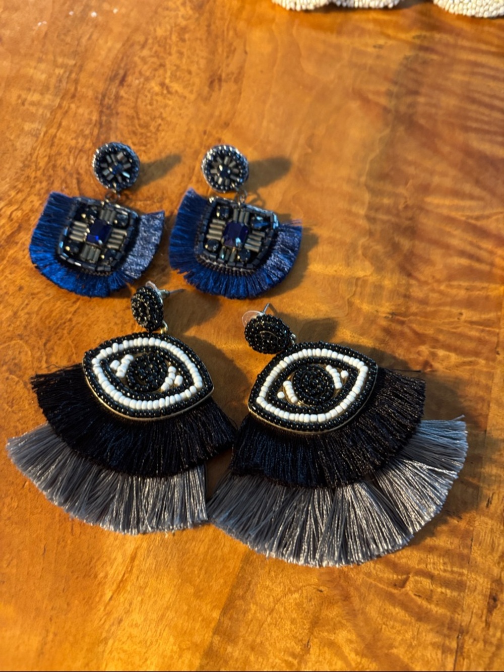 Two pairs beaded fringed pierced earrings - blue/black, black/gray